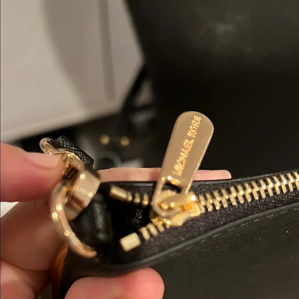Michael Kors Black Clutch with Gold Hardware